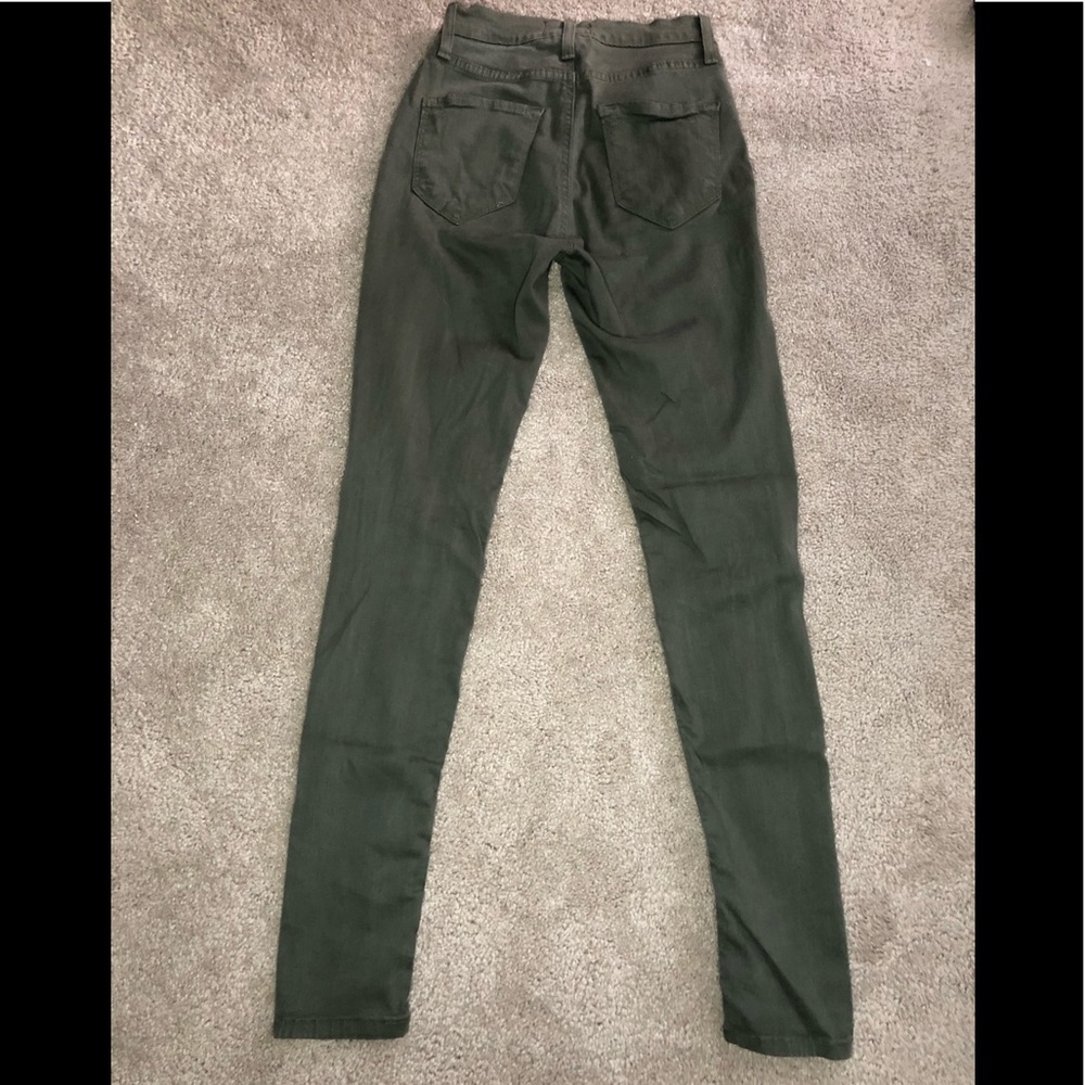 Green distressed jeans